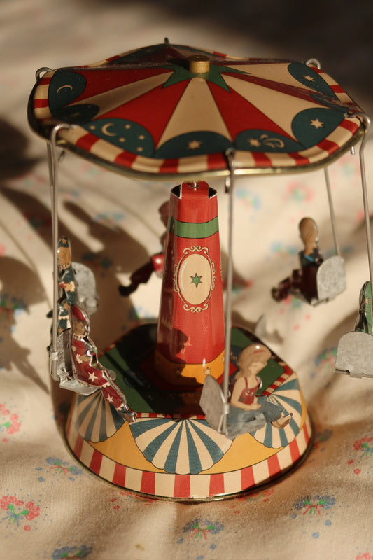 TIN CAROUSEL